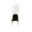 Abstract brass chair with twig-inspired frame and fine fabric upholstered seat
