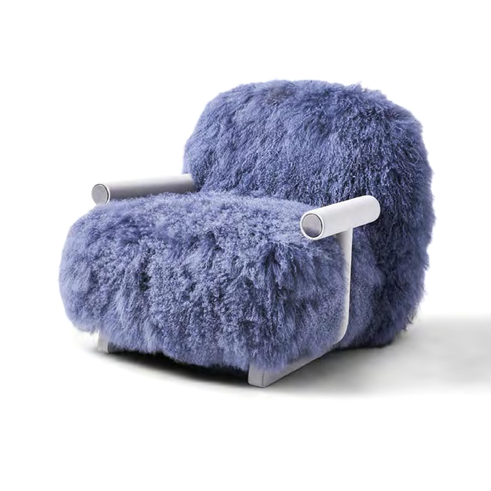 Premium sheepskin lounge chair featuring long-wool covering in natural texture