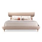 Modern luxury bed with curved headboard, alligator-embossed leather, and brass legs – Kalyste