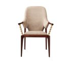 Luxury beige nubuck leather dining chair with brass hourglass arm supports front view