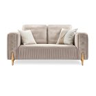Designer sofa with fold-wrinkle front detail and tufted armrests