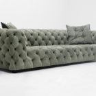 Moon Surface Sofa by Baxter with hand-tufted natural leather and sculptural curves.