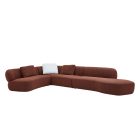 Surf Modular Sofa with curved modern design and deep cushioned seating in a contemporary living space.