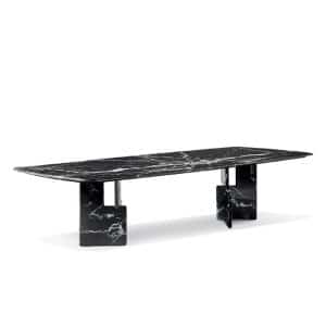 Nico Dining Table with geometric panel legs and marble or solid wood top in modern minimalist design.