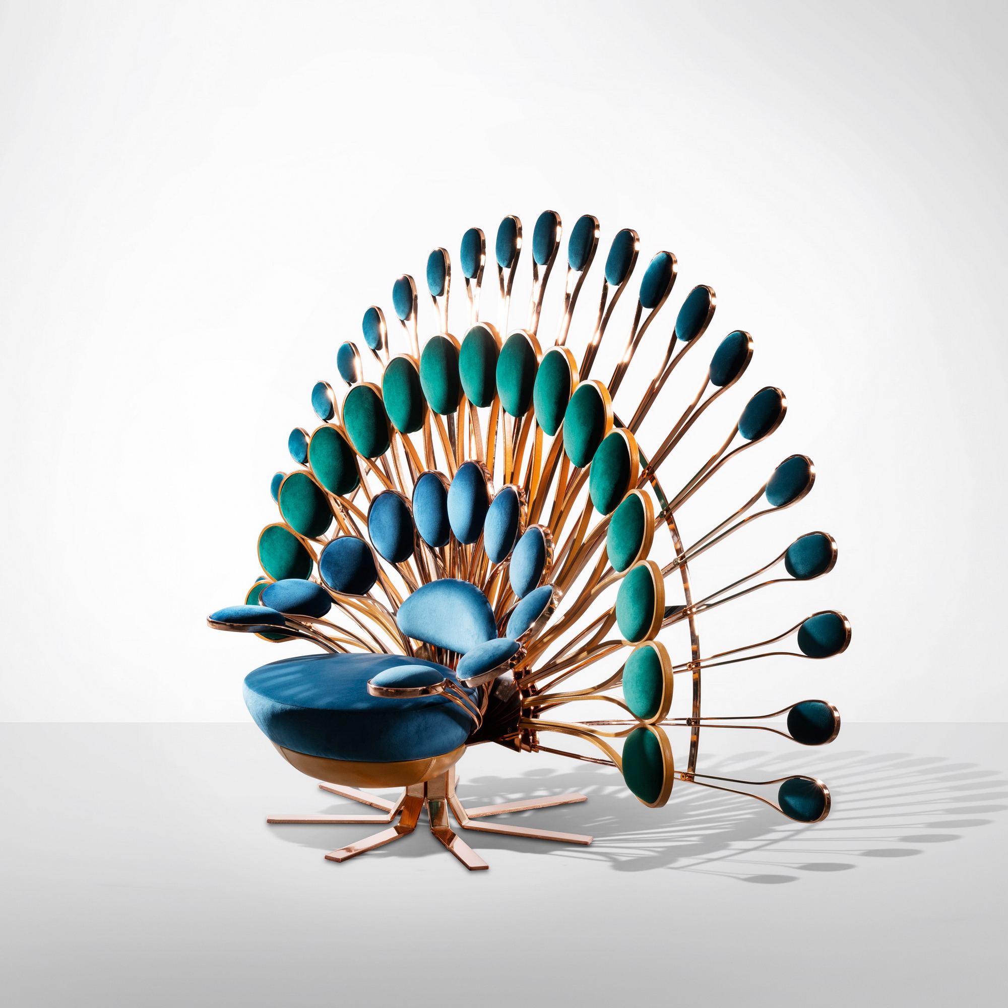 Side view of Pavone Chair showing curved silhouette and detailed craftsmanship.