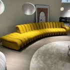 Snake Sofa modular yellow leather design with sculptural connected seating units.