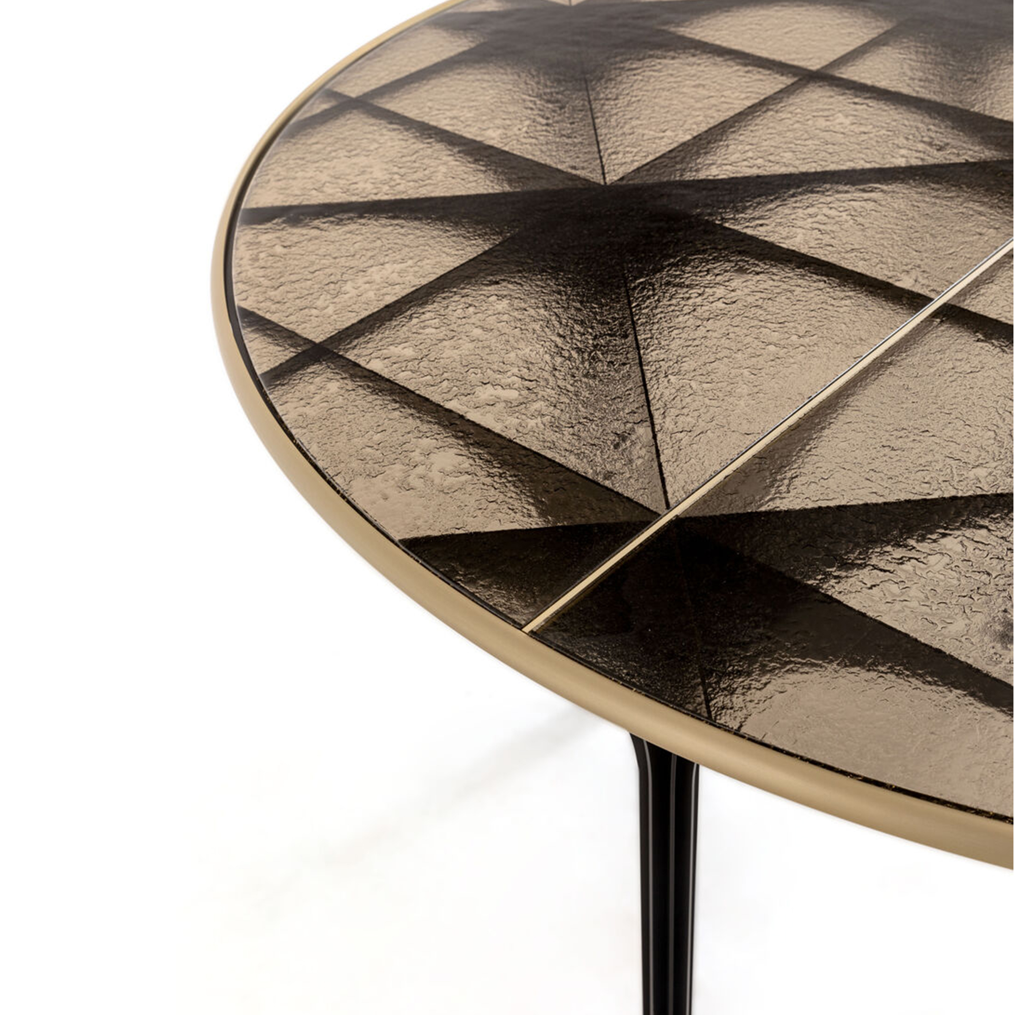 Large coffee table featuring a grey kiln-formed glass top and gold-coated frame.