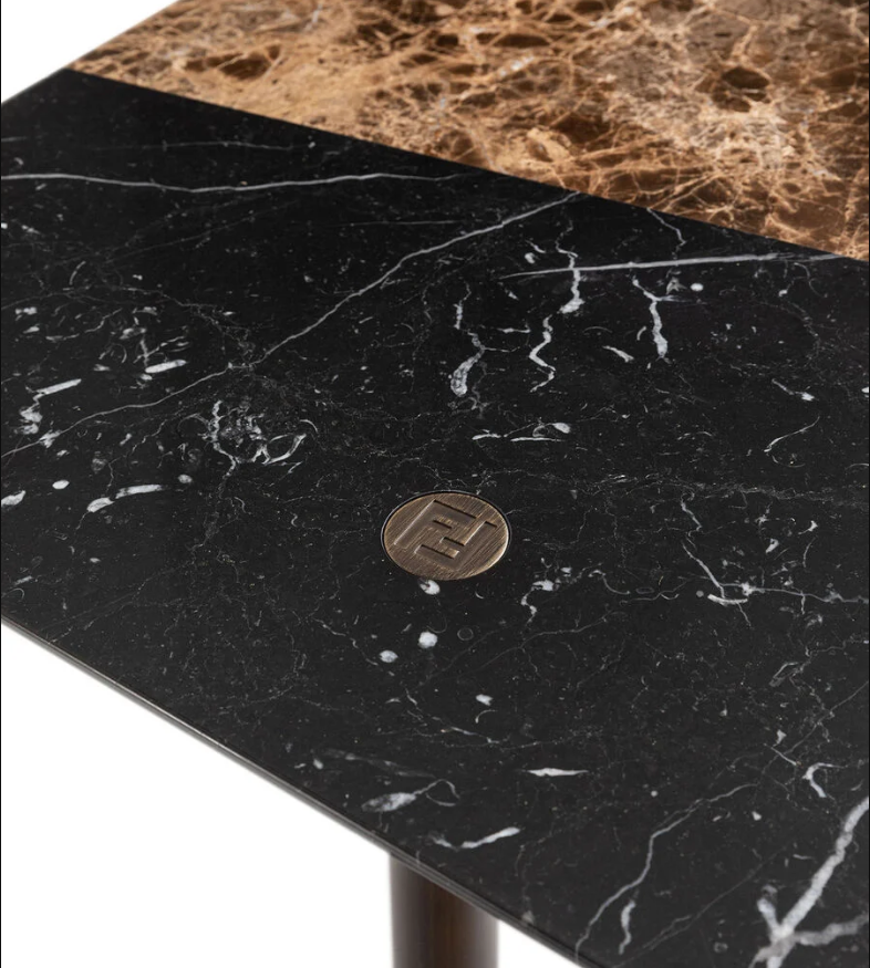Low-profile coffee table in black and white marble with a Calacatta Rosa inlay.