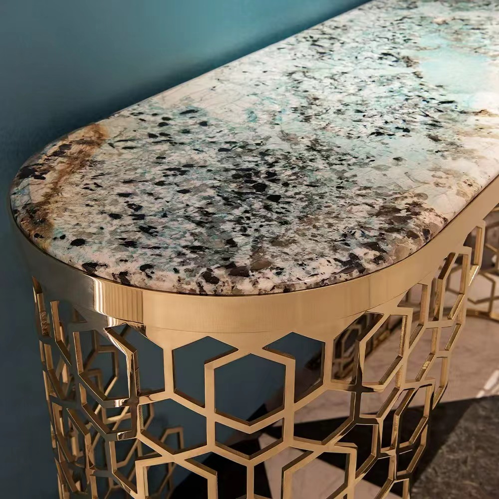 Picasso marble and golden stainless console detail and interior scene