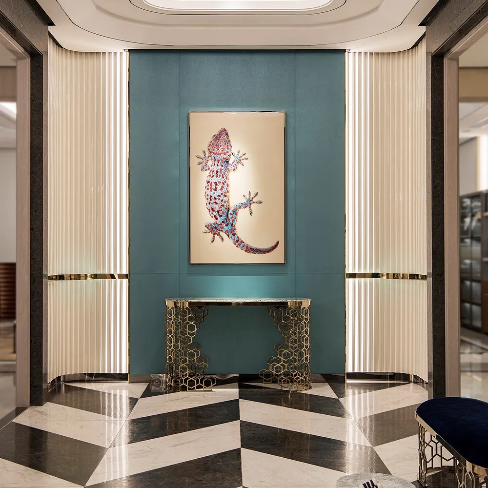 Picasso marble and golden stainless console detail and interior scene