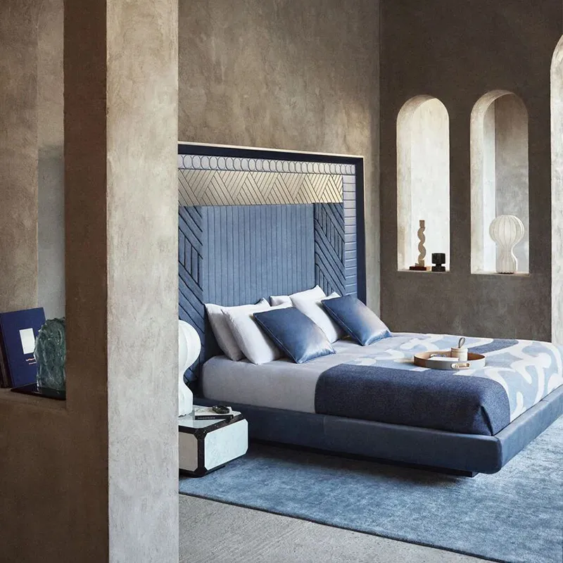 Minimalist low-profile platform bed with lacquered wood and microfiber leather headboard accents.