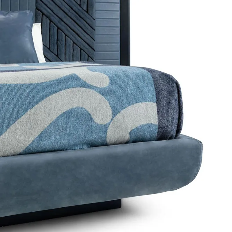 Minimalist low-profile platform bed with lacquered wood and microfiber leather headboard accents.