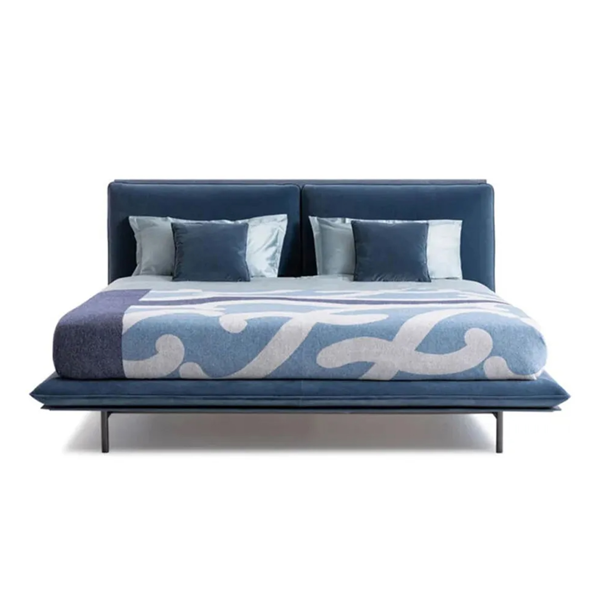 Contemporary fabric upholstered bed frame with polished stainless steel tapered legs.
