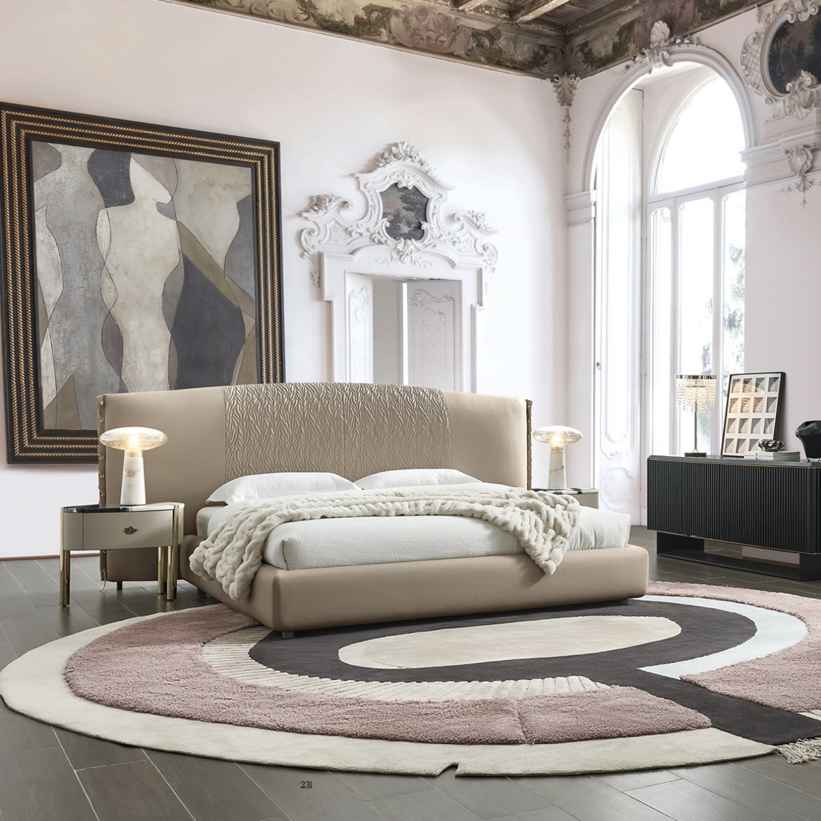 High-fashion tufted fabric luxury bed with gunmetal chain link accents and metal eyelets.