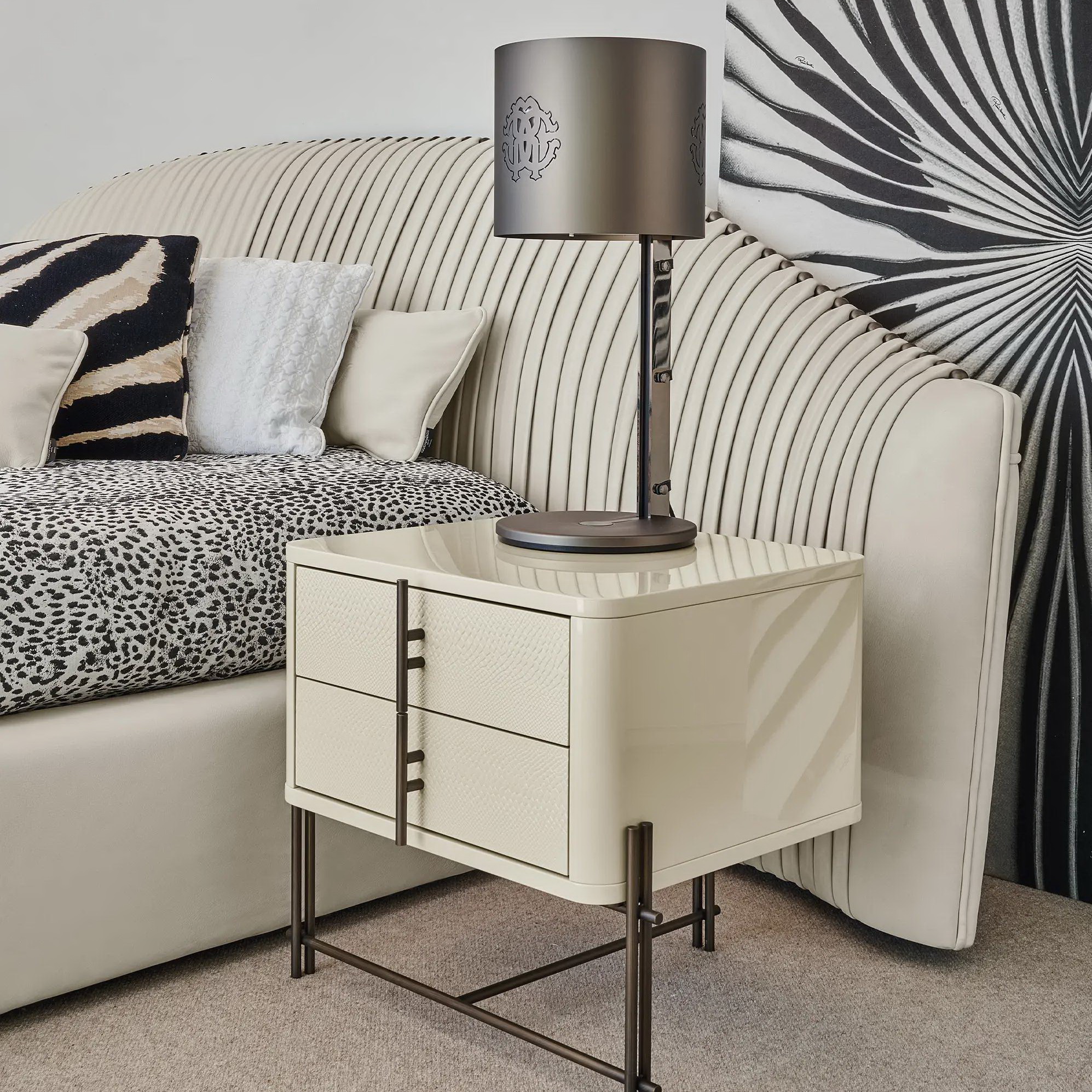Luxury pleated velvet bed with soft cascading ruching effect and black titanium legs.