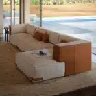Aveline modular sofa with fabric upholstery and saddle leather armrests