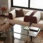 Aveline modular sofa with fabric upholstery and saddle leather armrests