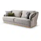 Inara Pleated Leather sofa with pleated leather back and gold metal base