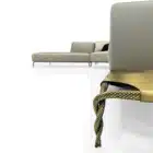 Serpenta Sculptural sofa with bronze textured metal base