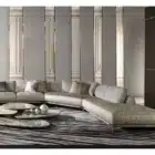 Serpenta Sculptural sofa with bronze textured metal base